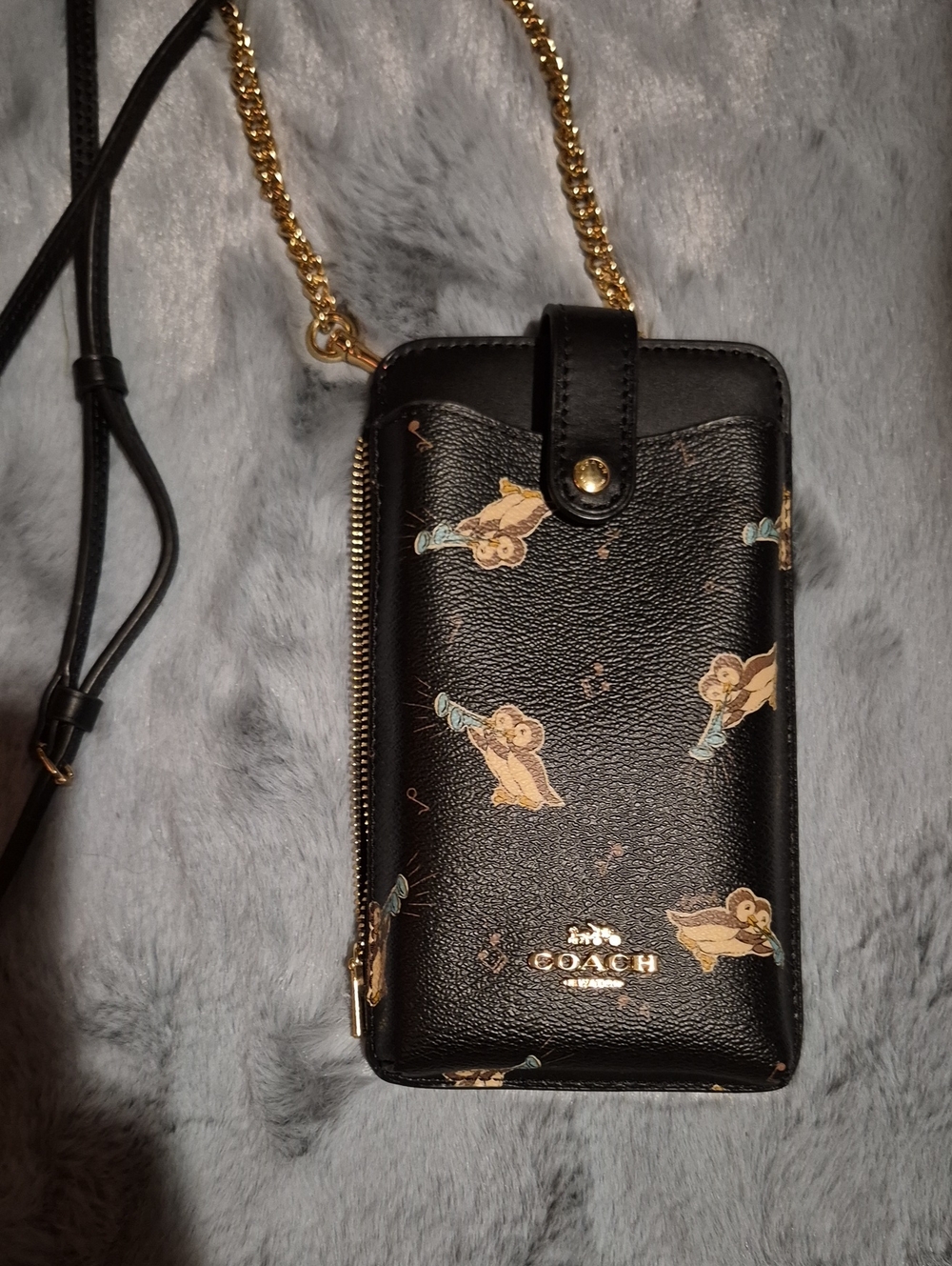 Coach Black Leather Crossbody Phone Pouch with Cherub Motif
